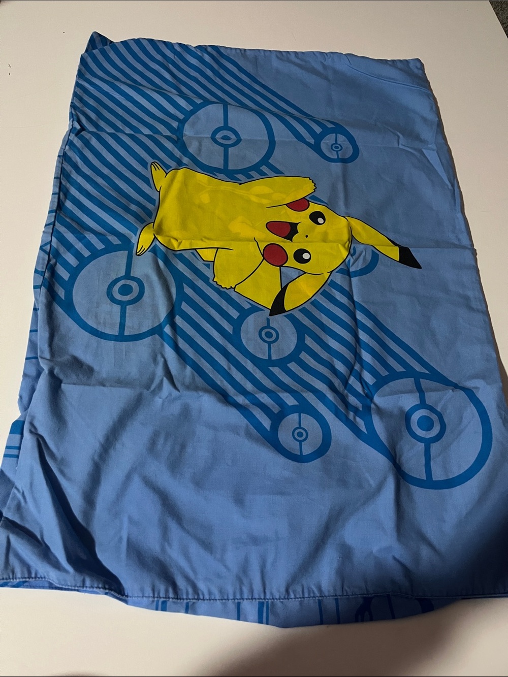 Pokemon Yellow Pikachu Pillowcase on Blue Pokeball Design